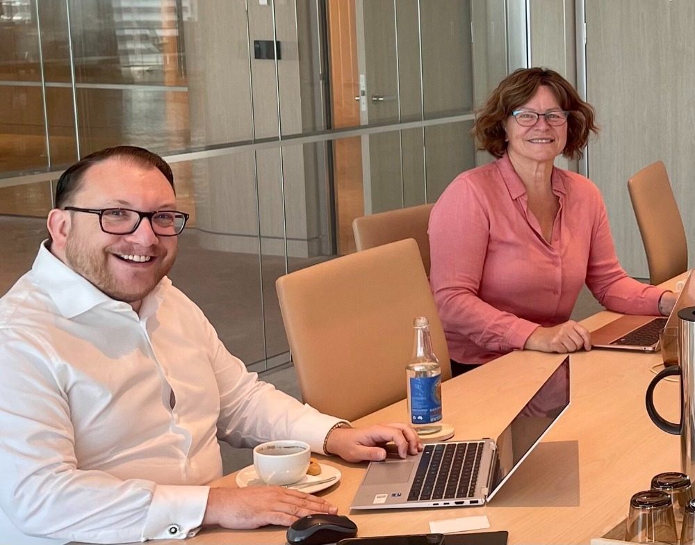 ALBEI directors working together around a meeting table
